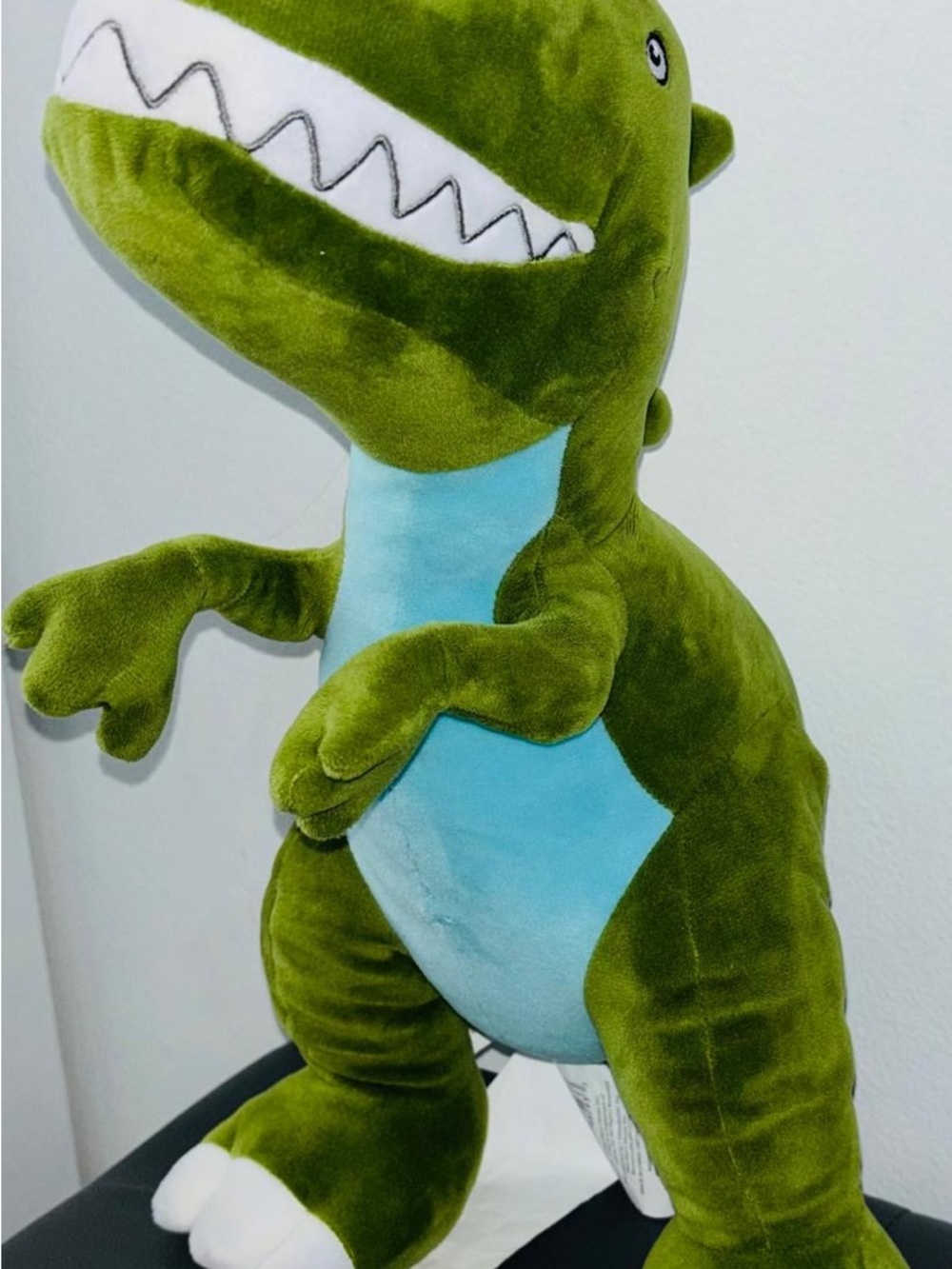 Green Plush Dinosaur Toy with Light Blue Belly
